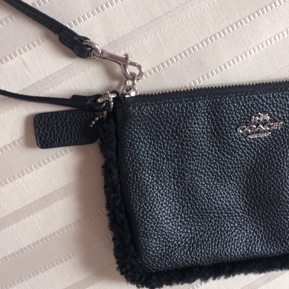 Adorable Sherpa lined Coach wristlet - Picture 2 of 4